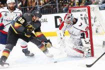 Golden Knights left wing Tomas Nosek (92) tries to get the puck in against Washington Capitals ...