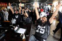 Las Vegas Raiders fans, including from right, Robert Lopez of Riverside, Calif., Cynthia and Hu ...