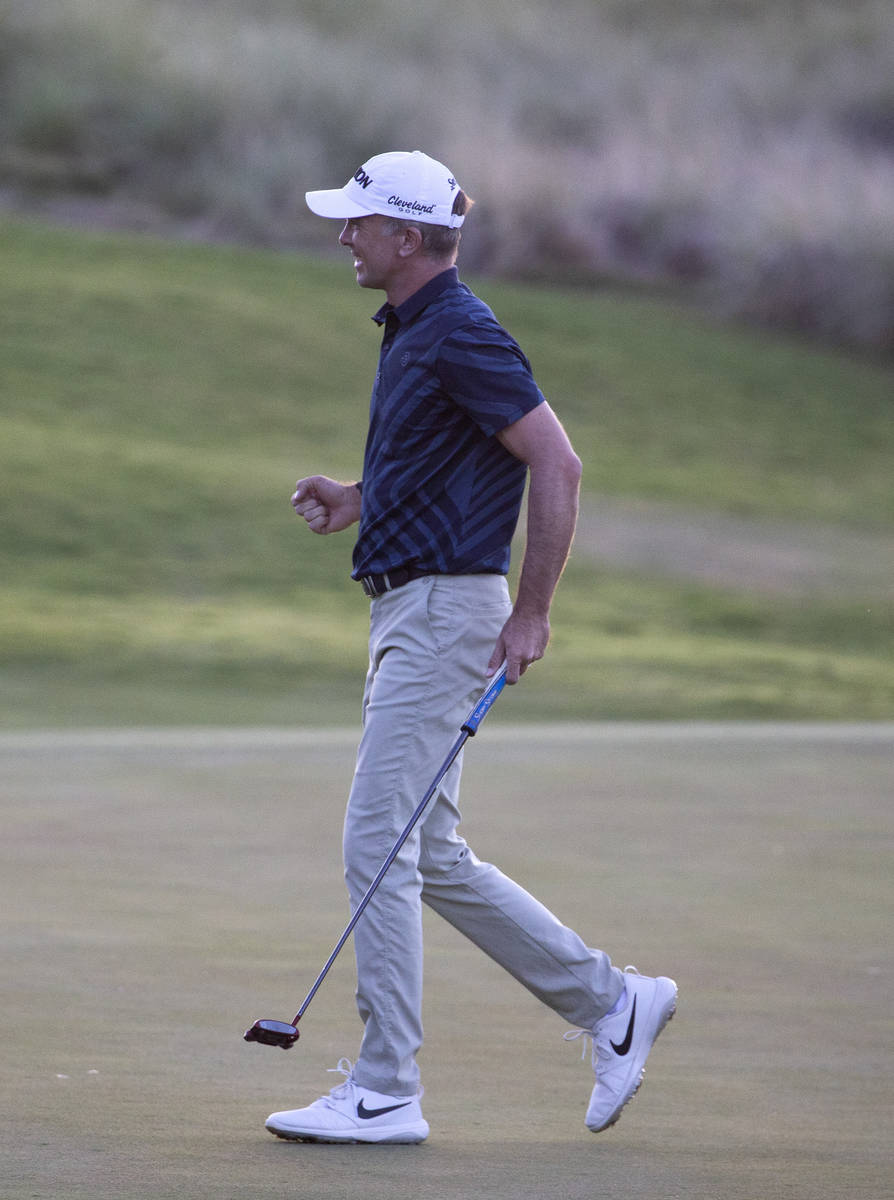 Martin Laird celebrates after making the winning putt on the 17th hole during a playoff in the ...