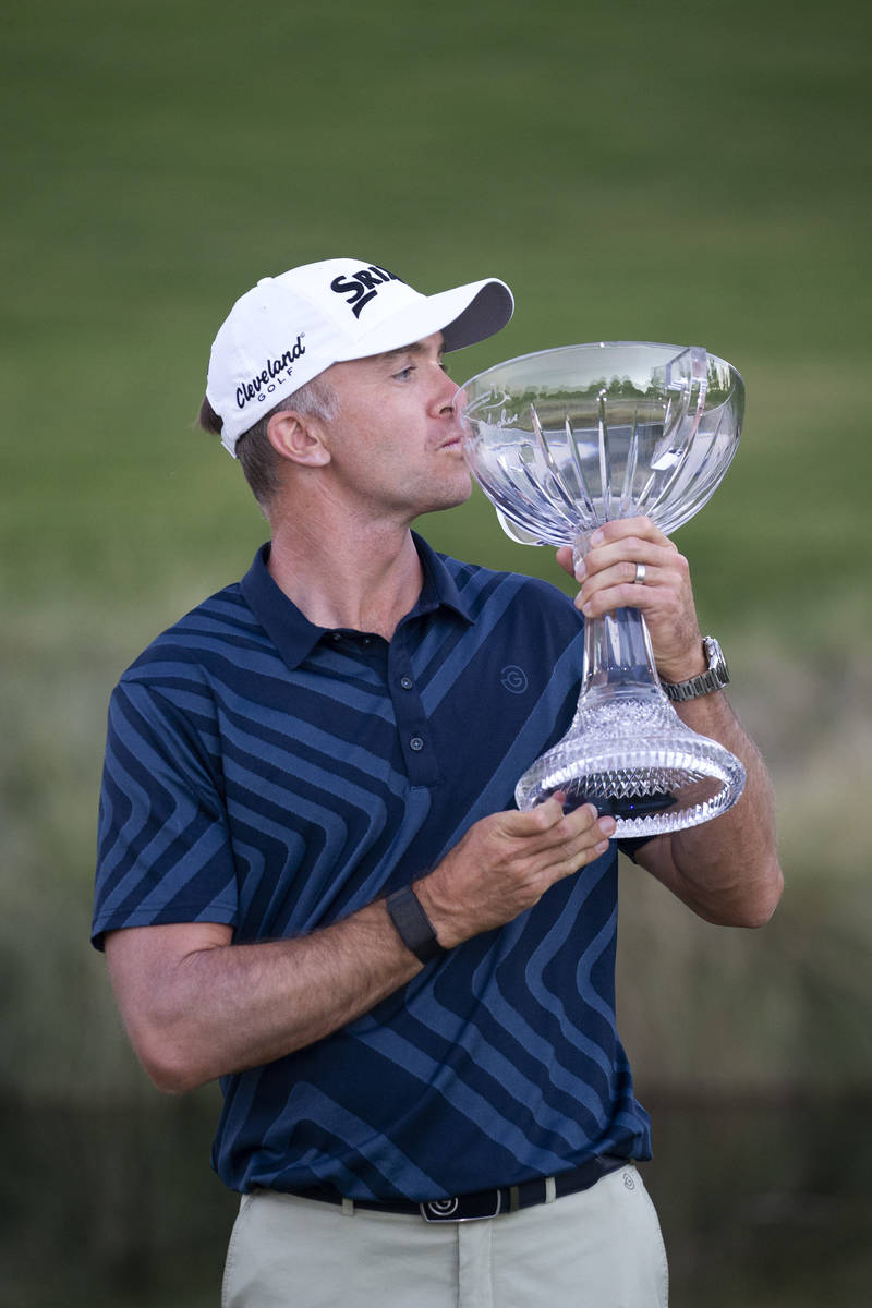 Martin Laird kisses his newly won trophy after winning the final round of the 2020 Shriners Hos ...