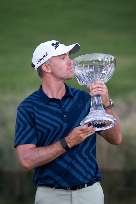 Martin Laird kisses his newly won trophy after winning the final round of the 2020 Shriners Hos ...