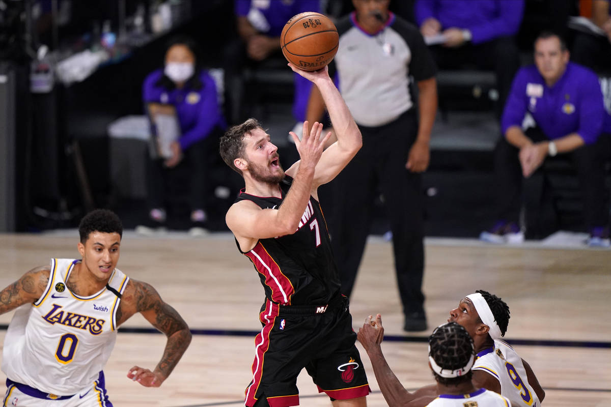 Miami Heat's Goran Dragic (7) shoots during the second half in Game 6 of basketball's NBA Final ...