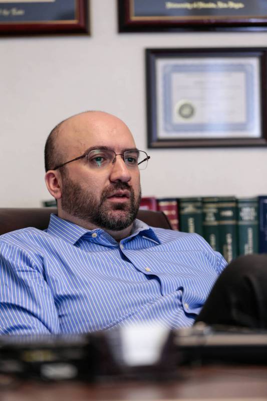 Lawyer Alex Ghibaudo pauses during an interview in his Las Vegas office on Feb. 18, 2015. (Revi ...