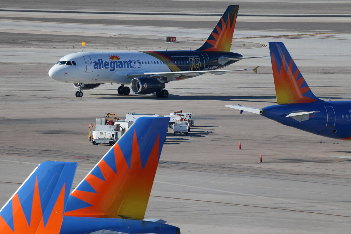 An Allegiant Air airplane taxis at McCarran International Airport in Las Vegas, Tuesday, Jan. 1 ...