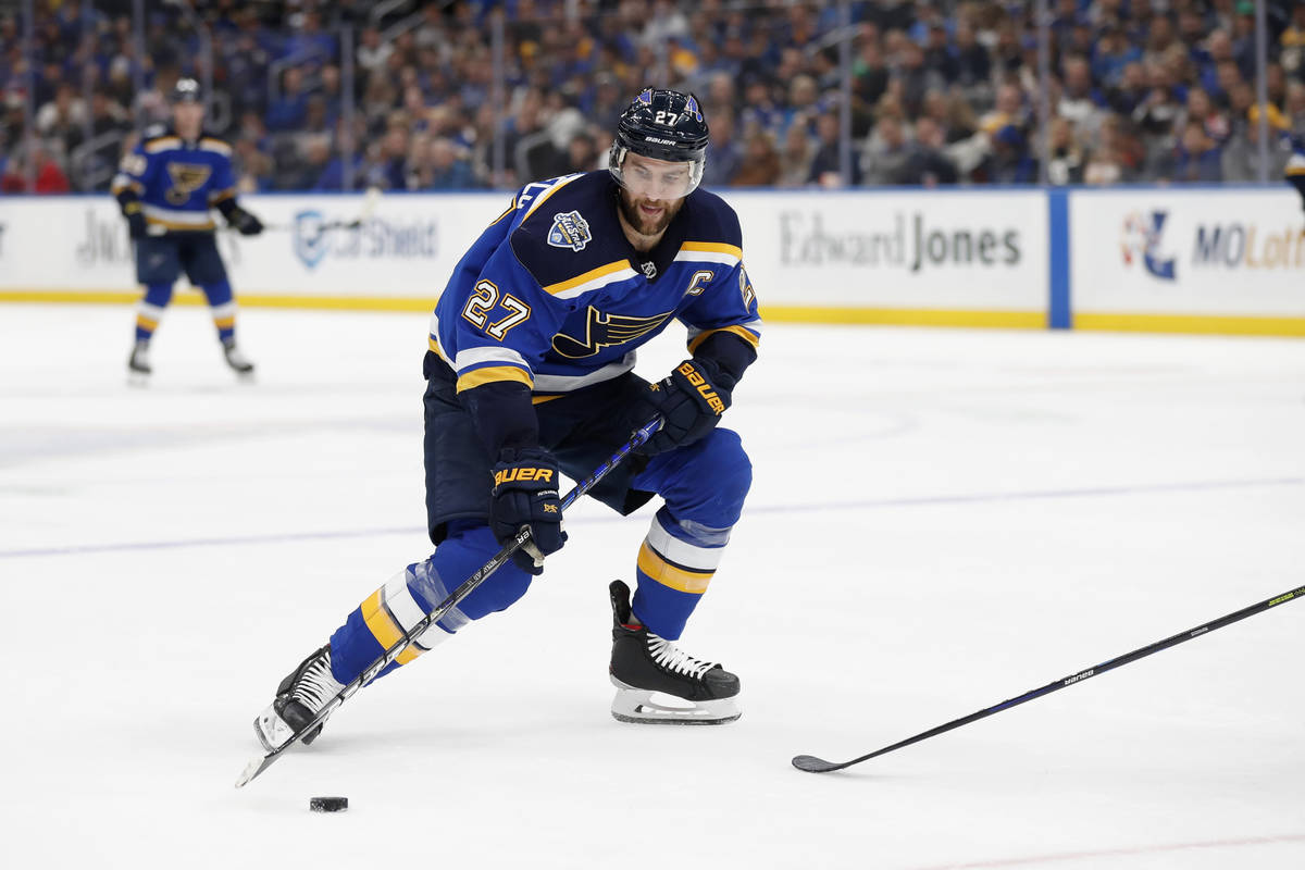 St. Louis Blues' Alex Pietrangelo handles the puck during the second period of an NHL hockey ga ...