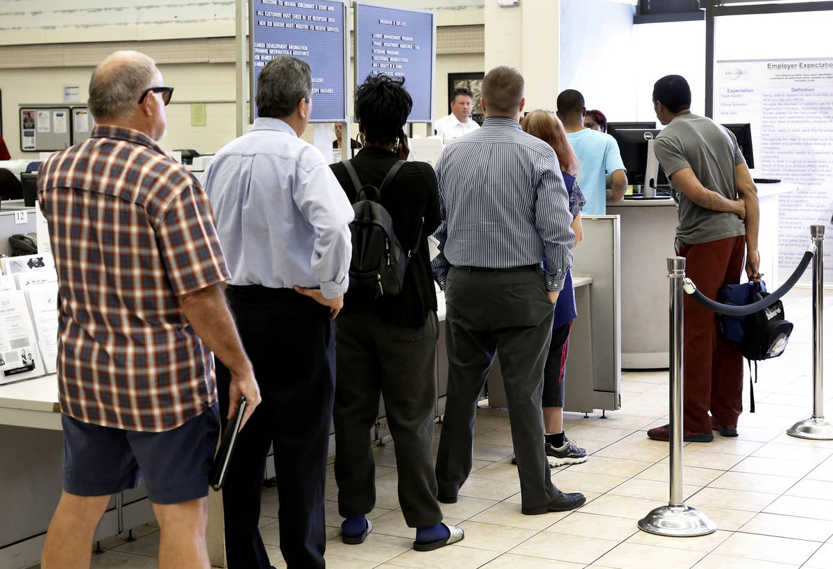 Job seekers lined up to register at JobConnect office at 3405 S. Maryland Pkwy on Friday, April ...