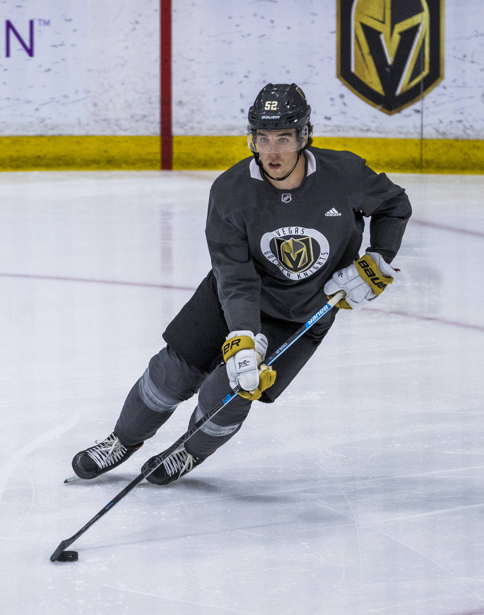 Vegas Golden Knights defenseman Dylan Coghlan (52) controls the puck during practice at City Na ...
