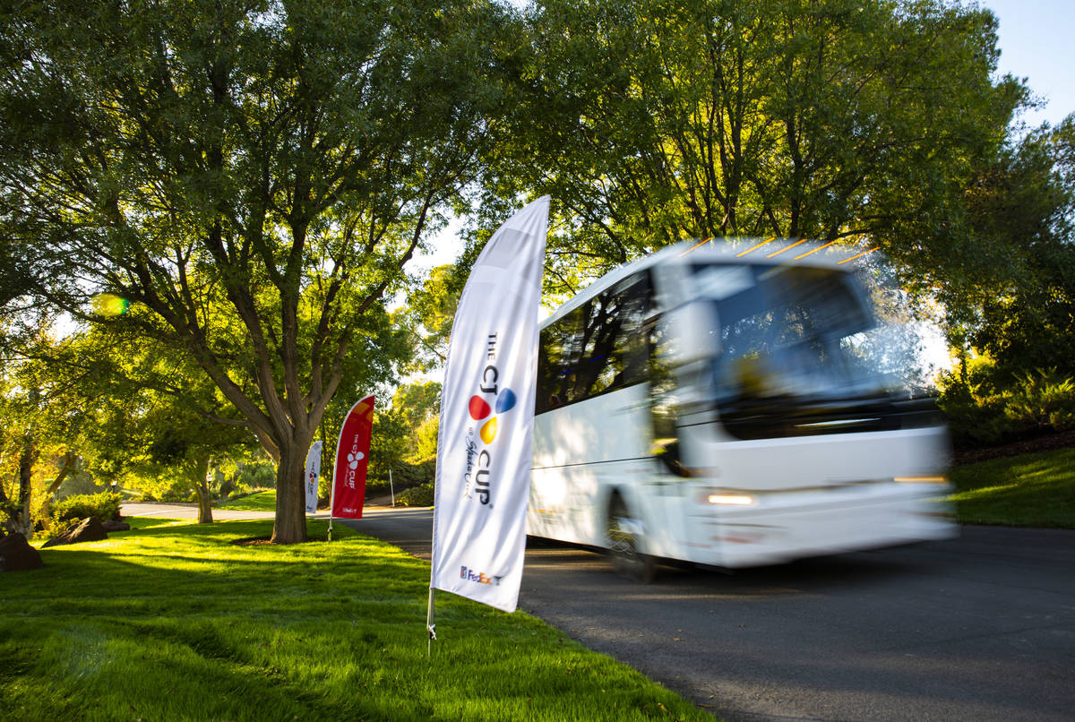 A shuttle passes by signage for the CJ Cup at the Shadow Creek Golf Course in North Las Vegas o ...