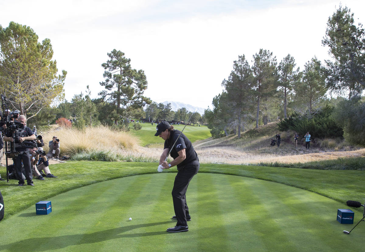 Phil Mickelson hits from the second tee box during The Match at Shadow Creek Golf Course in Nor ...
