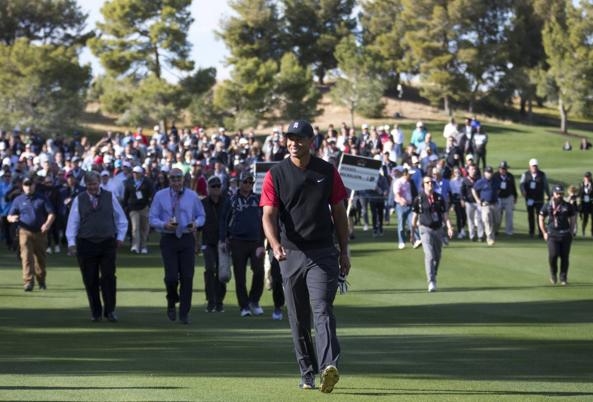 Tiger Woods walks the fourth fairway during The Match at Shadow Creek Golf Course in North Las ...