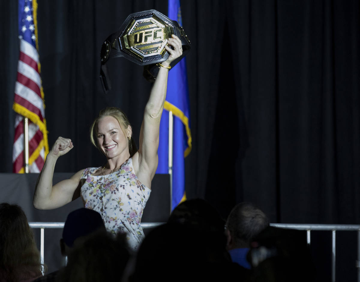 Current UFC Women's Flyweight champion Valentina Shevchenko holds up her championship belt duri ...