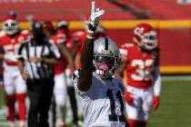 Las Vegas Raiders wide receiver Henry Ruggs III (11) celebrates after making a big catch in the ...