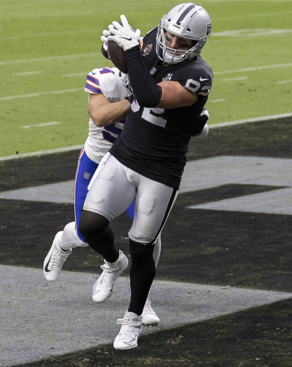 Las Vegas Raiders tight end Jason Witten (82) makes a touchdown catch over Buffalo Bills outsid ...