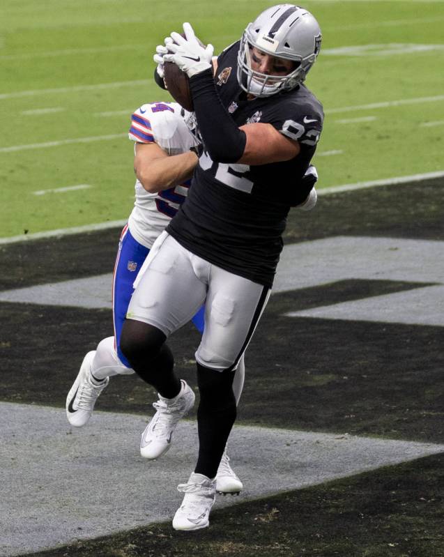 Las Vegas Raiders tight end Jason Witten (82) makes a touchdown catch over Buffalo Bills outsid ...