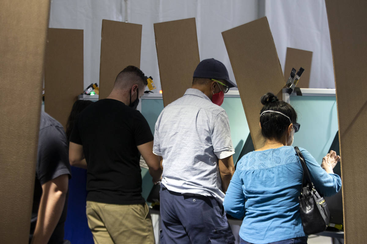 Voters cast their ballots at the Boulevard Mall early voting location on Saturday, Oct. 17, 202 ...