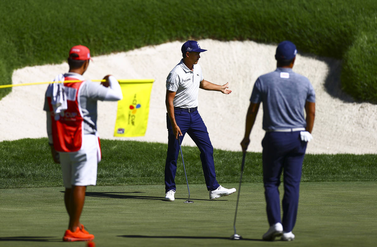 Rickie Fowler reacts after putting on the 18th green during the second round of the CJ Cup at t ...