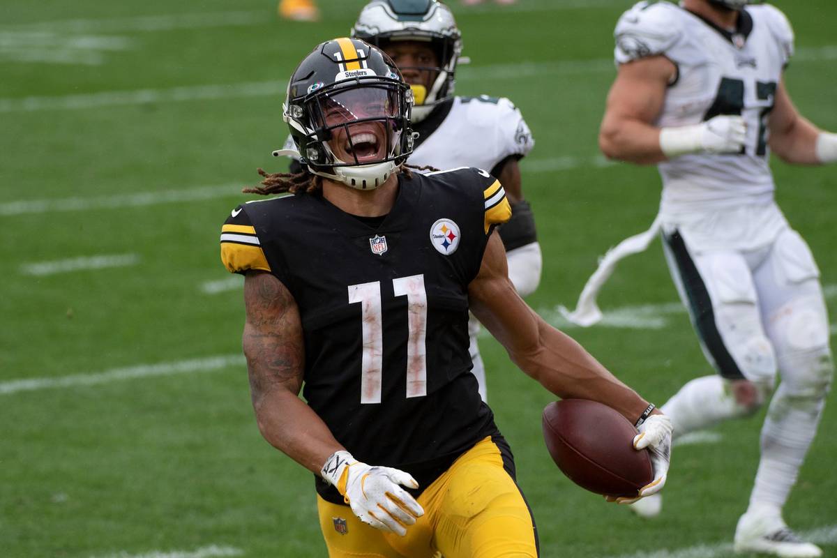 Pittsburgh Steelers wide receiver Chase Claypool (11) reacts as he runs into the end zone for a ...