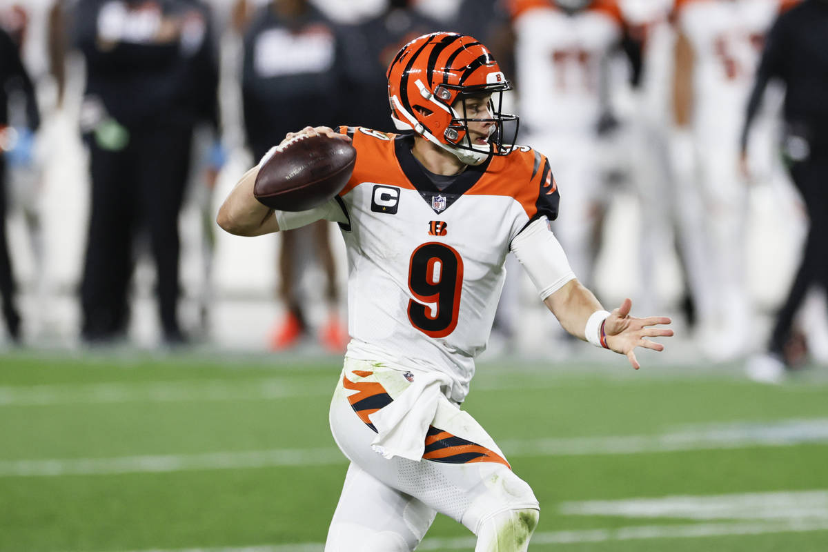 Cincinnati Bengals quarterback Joe Burrow throws during the second half of an NFL football game ...