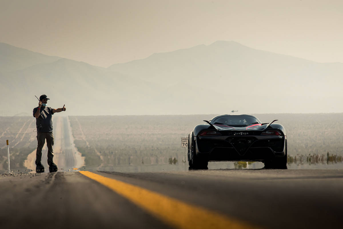 An SSC Tuatara driven by Oliver Webb prepares to set out on his record-breaking public road spe ...