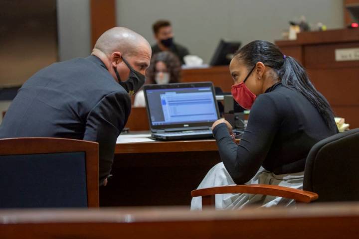 Lead prosecutor John Giordani converses with prosecutor Leah Beverly during a preliminary heari ...