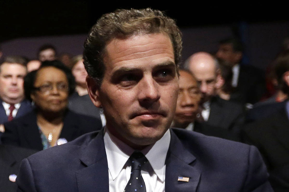 In this Oct. 11, 2012, file photo, Hunter Biden waits for the start of the his father's, Vice P ...