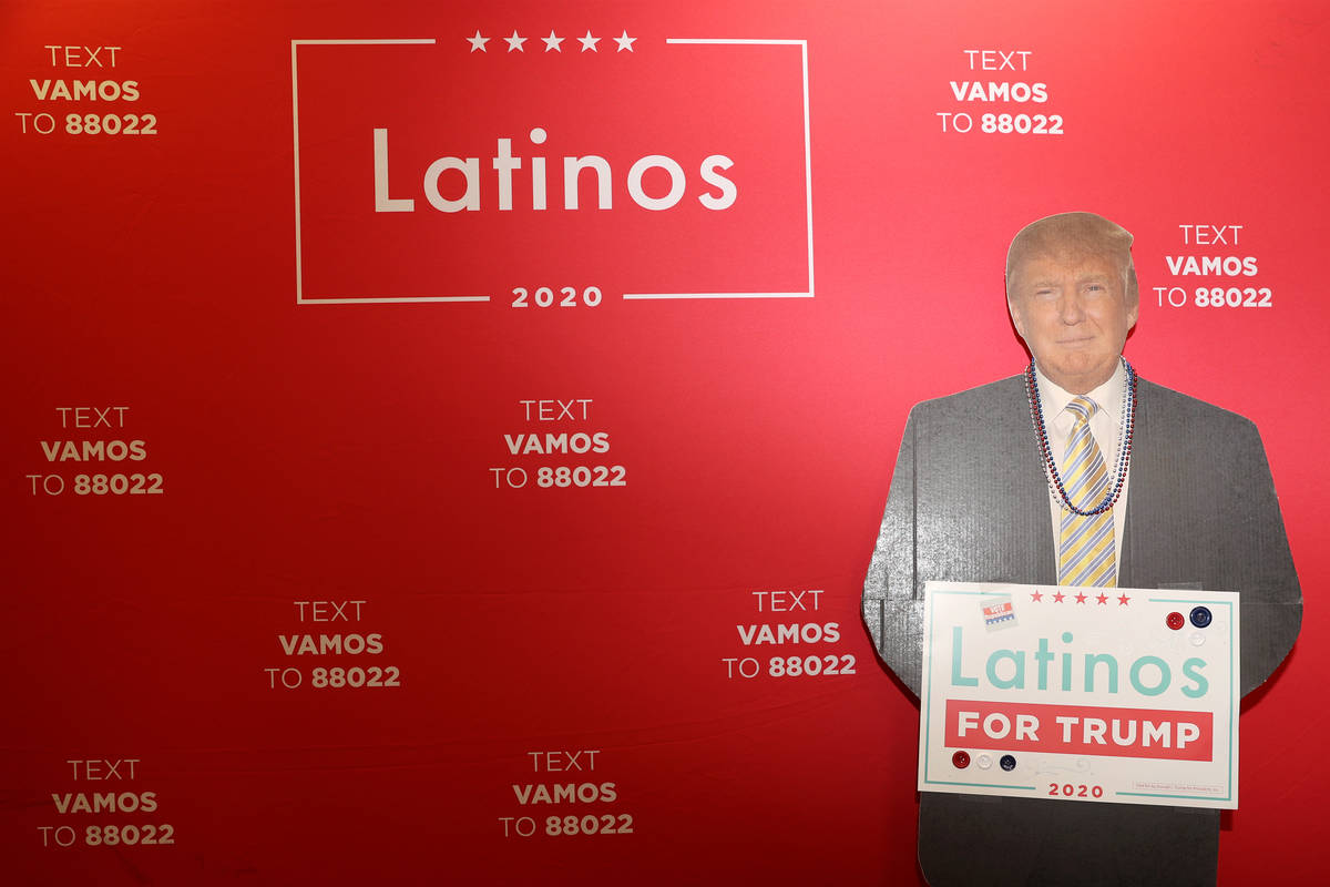 A cutout of President Donald J. Trump is seen during a phone banking event at the Latinos for T ...