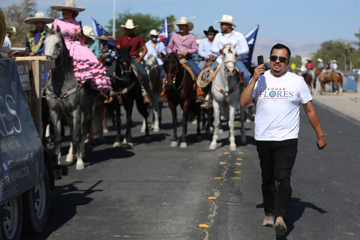 Assemblyman Edgar Flores leads a campaign parade to promote the Latino vote near the Walnut Com ...