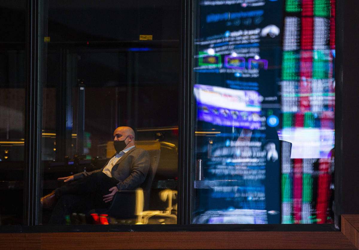 Brian Musburger, CEO of VSiN, is seen through a window near the Circa Sportsbook during a tour ...