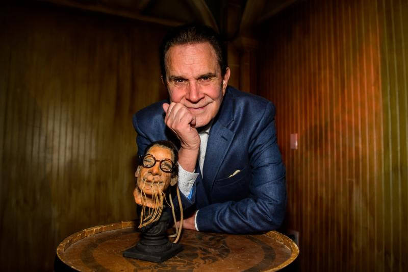 Rich Little, shown with his new shrunken head at Golden Tiki on Tuesday, April 24, 2018. (Brent ...