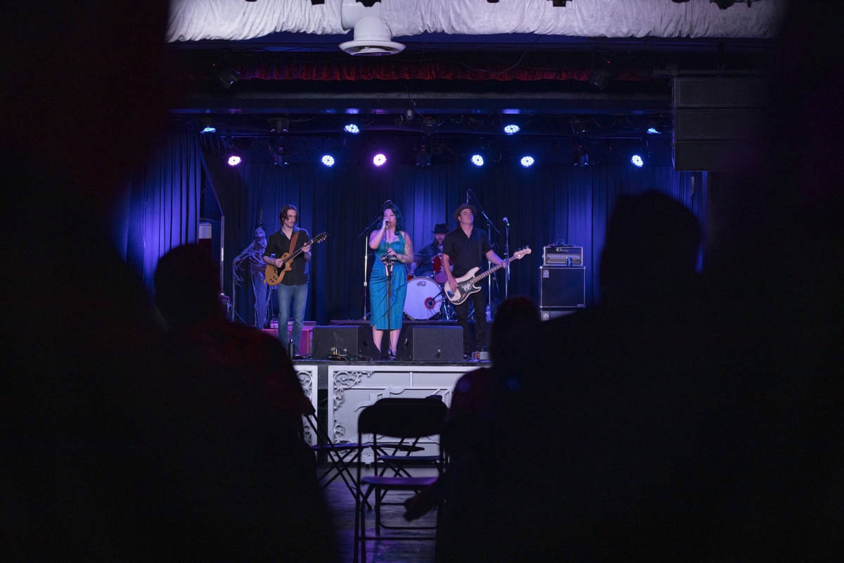 Concert goers listen to Shanda & the Howlers preform as live music returns at the Fremont C ...