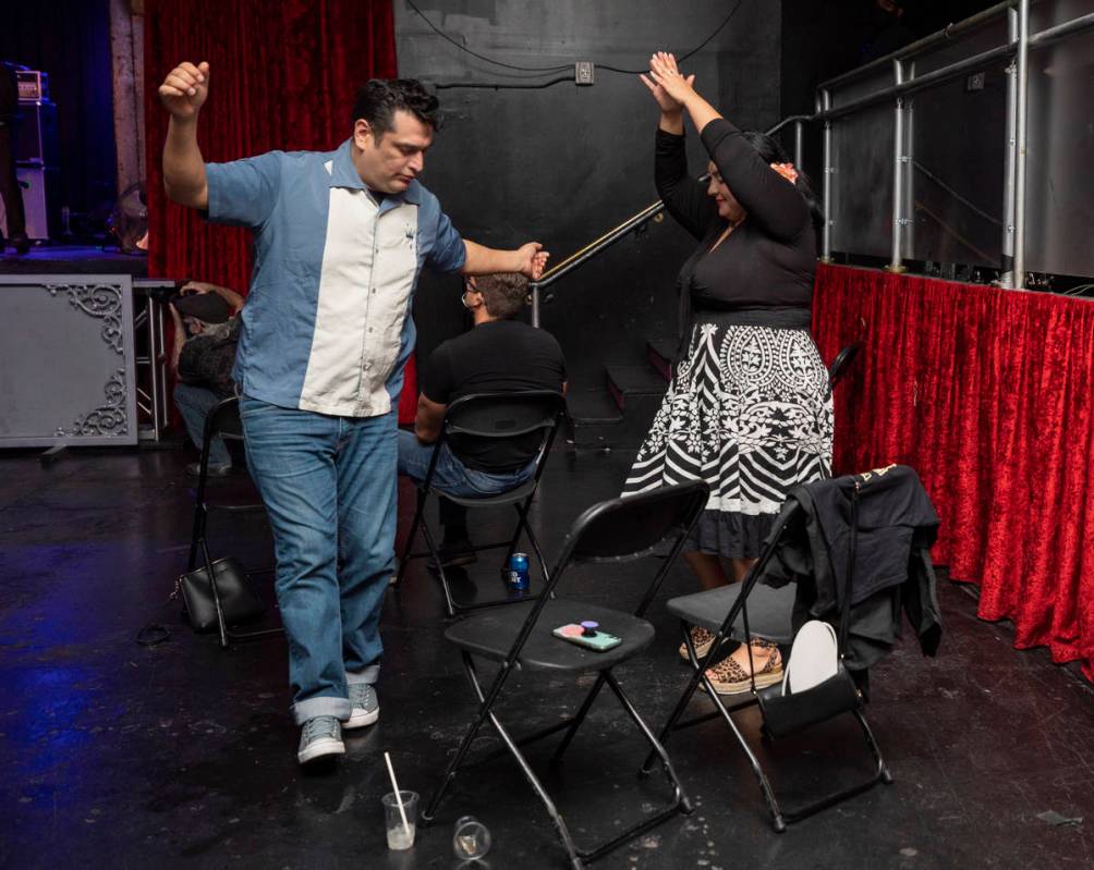 Rey Castillo, 43, of Los Angeles, left, dances with Veronica Berdugo, 37, of Los Angeles while ...