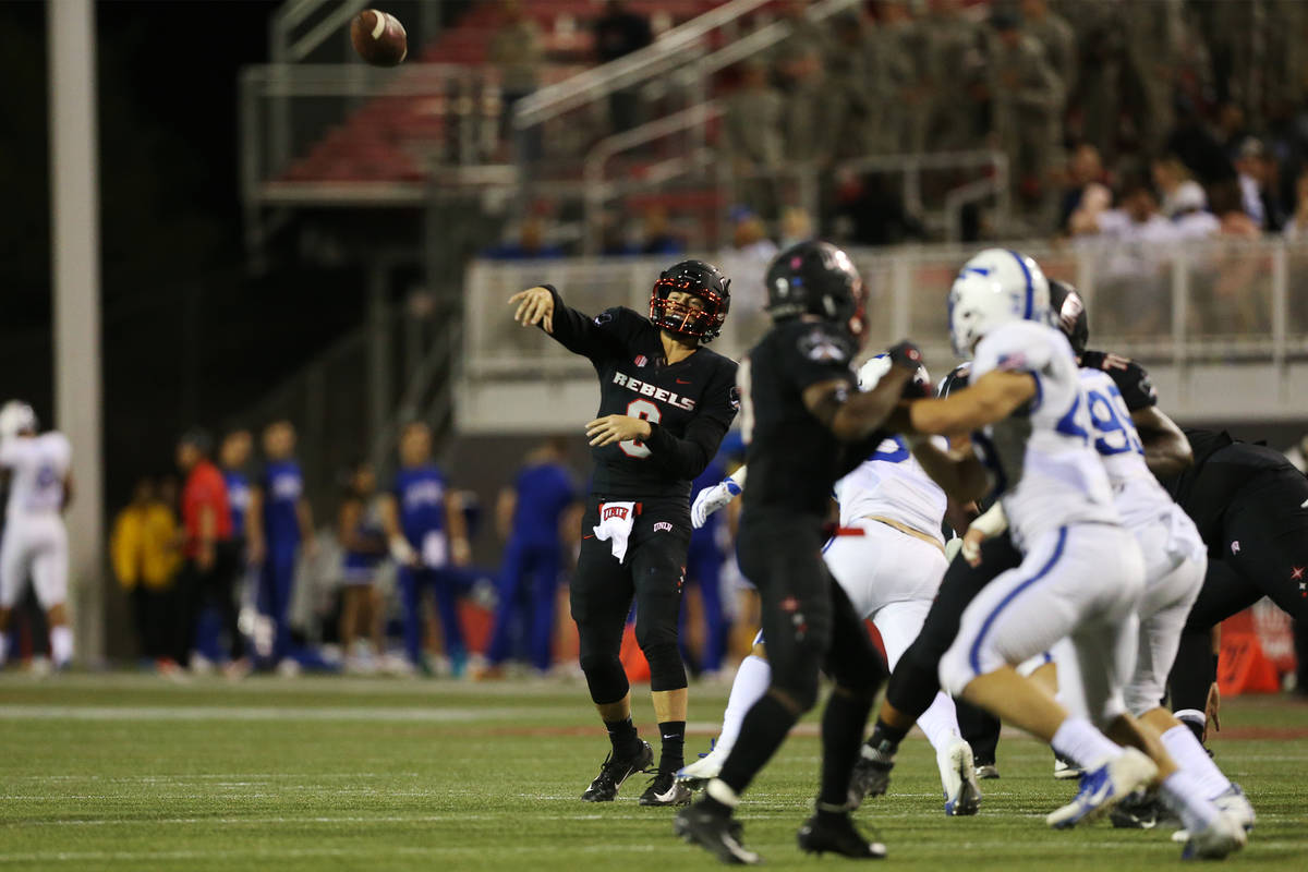 UNLV Rebels quarterback Max Gilliam (6) makes a pass against Air Force Falcons in the second qu ...