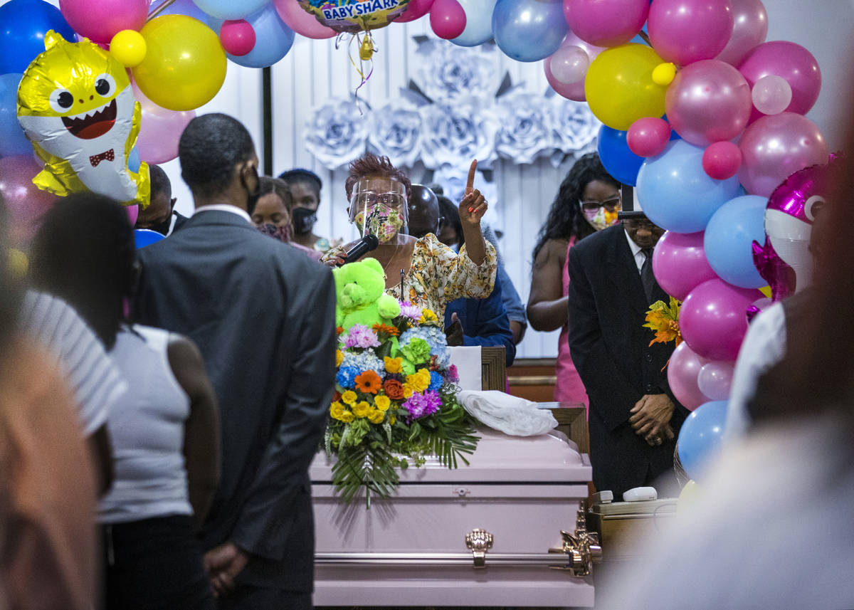 Diana Daniels gives a prayer as all stand during the funeral service for Sayah Deal at the Trie ...