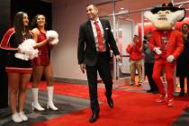 New UNLV football head coach Marcus Arroyo is introduced during a press conference at UNLV's Fe ...