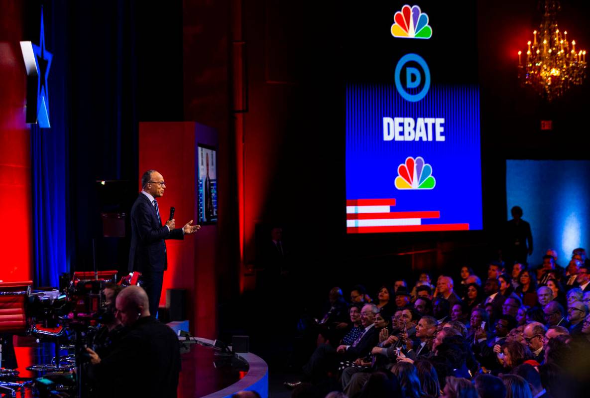 Lester Holt speaks before the start of the Democratic presidential debate at Paris Las Vegas on ...