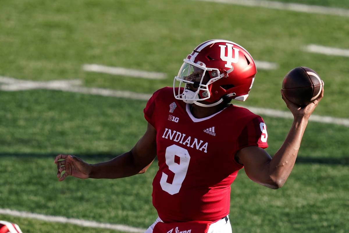 Indiana quarterback Michael Penix Jr. (9) throws during the first half of an NCCAA college foot ...