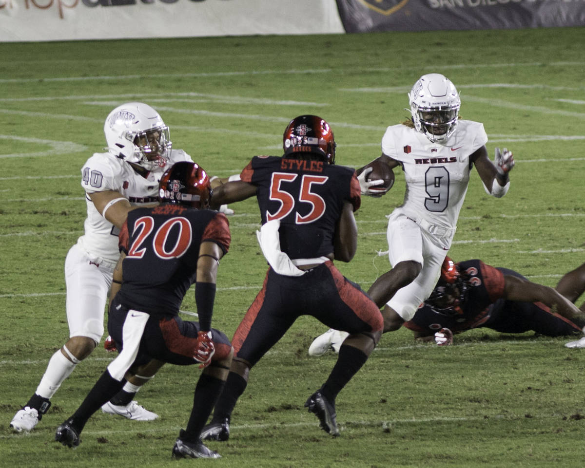 UNLV’s Tyleek Collins runs the ball back on a kickoff return during Saturday's Mountain West ...