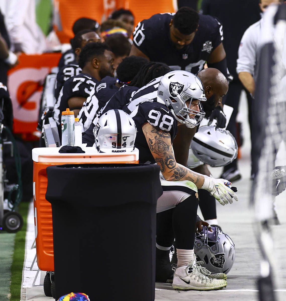 Las Vegas Raiders defensive end Maxx Crosby (98) looks on from the sidelines in the fourth quar ...