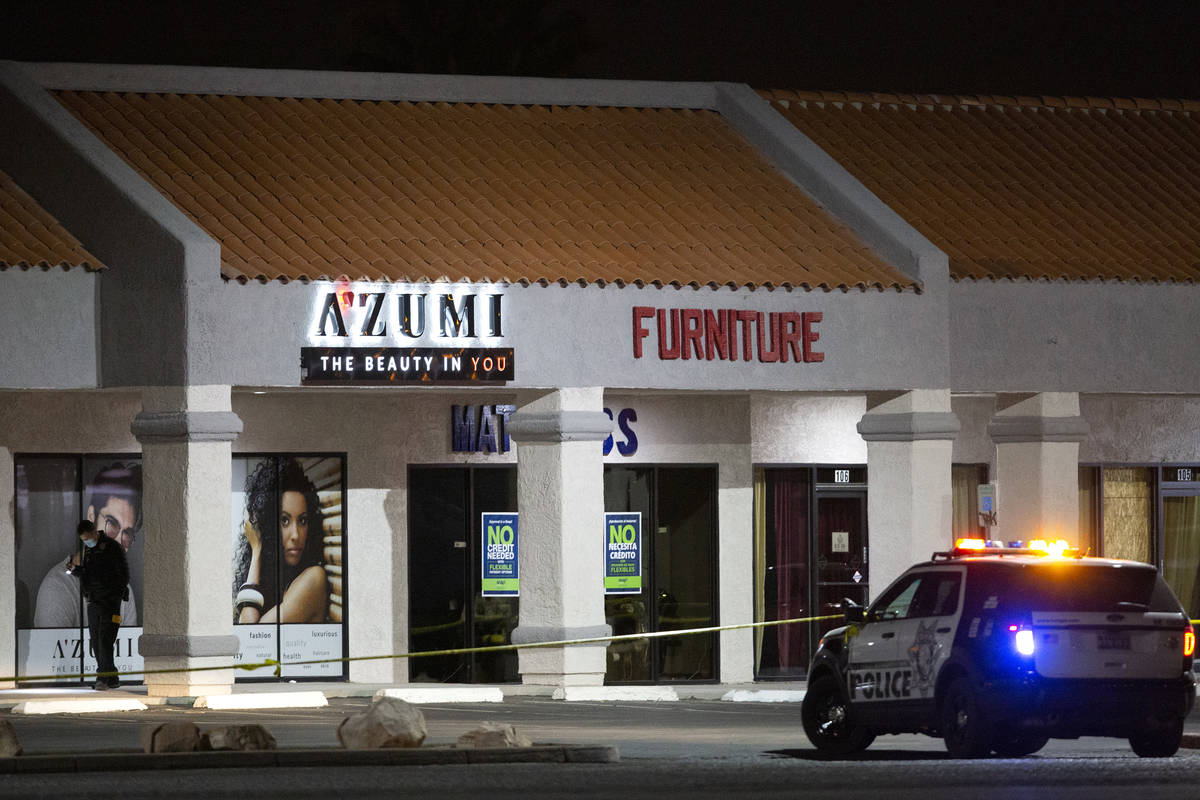 Metropolitan police investigate a homicide at a business near 3603 North Las Vegas Boulevard on ...