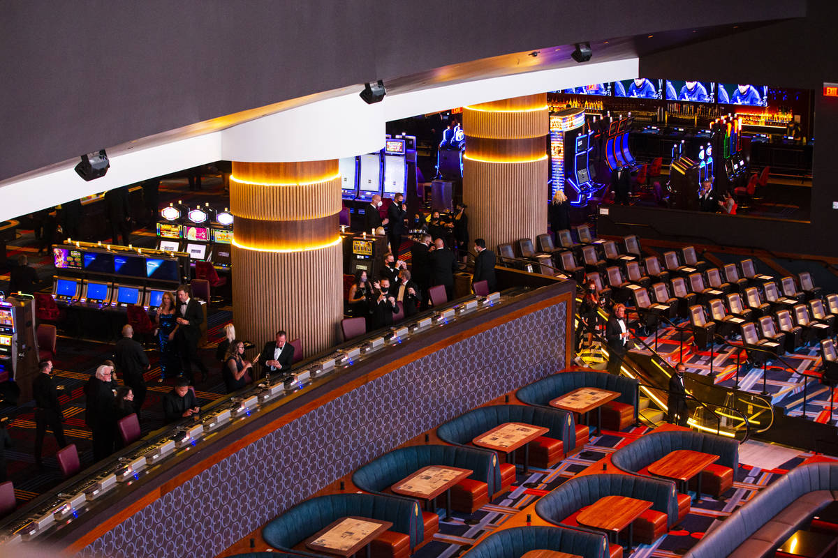 Invited guests explore Circa Sportsbook during the VIP black-tie grand opening event in downtow ...