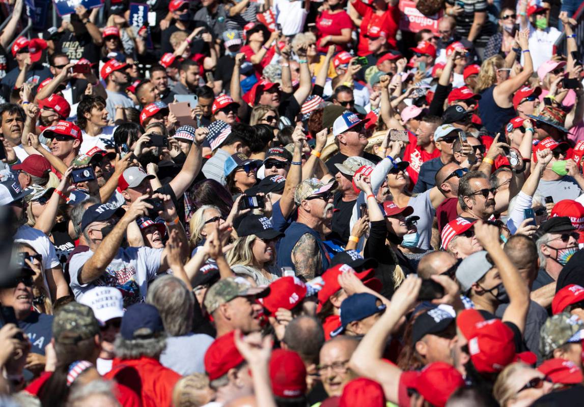 Supporters cheer as President Donald Trump speaks during Make America Great Again victory rally ...