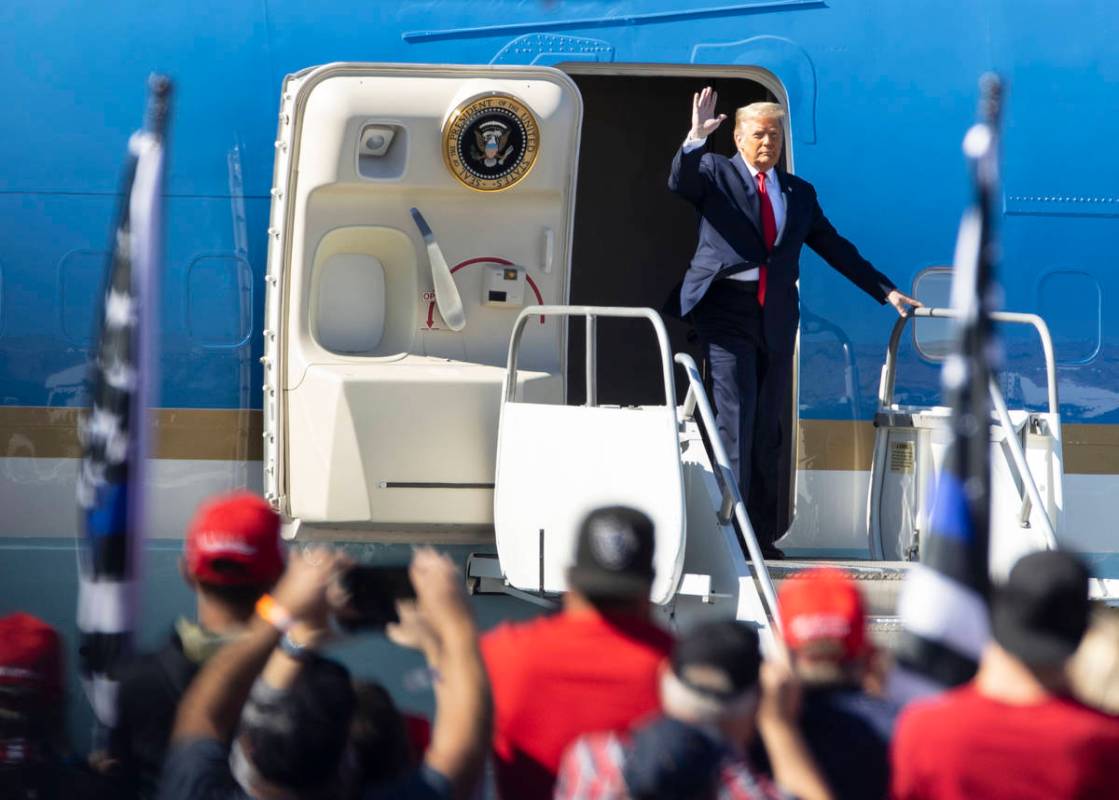 President Donald Trump arrives on Air Force One at Laughlin/Bullhead International Airport to a ...