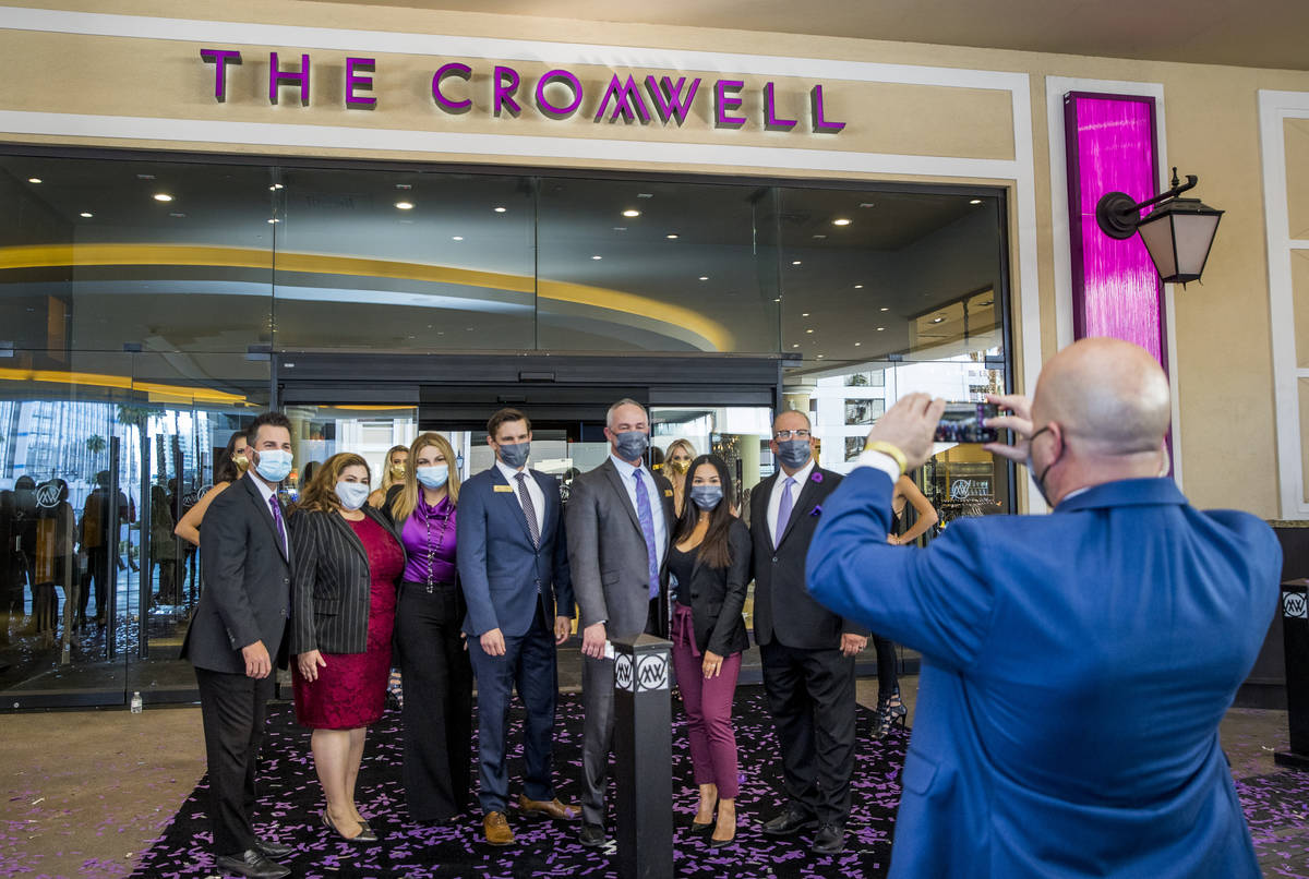 Staff gather to document the day out front following the reopening celebration for the The Crom ...