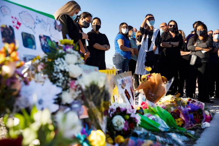 Mourners gather to pay their respects to Michelle Weissman, a bicyclist killed Sunday when a ma ...