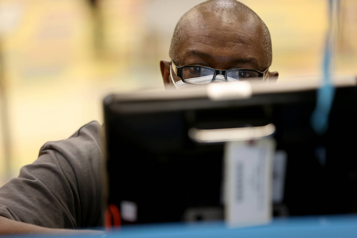 Mike Williams, 57, of Las Vegas, votes on the last day of early voting at Pearson Community Cen ...