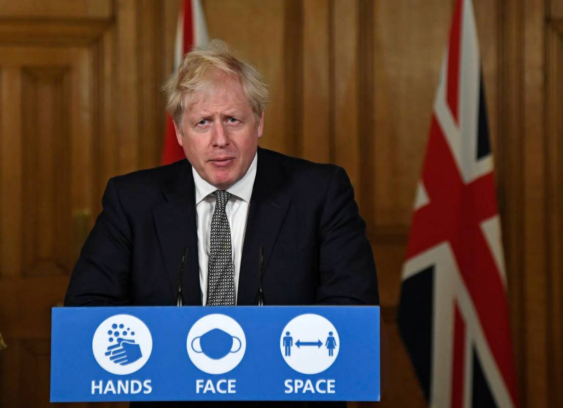 Britain's Prime Minister Boris Johnson speaks during a press conference in 10 Downing Street, L ...