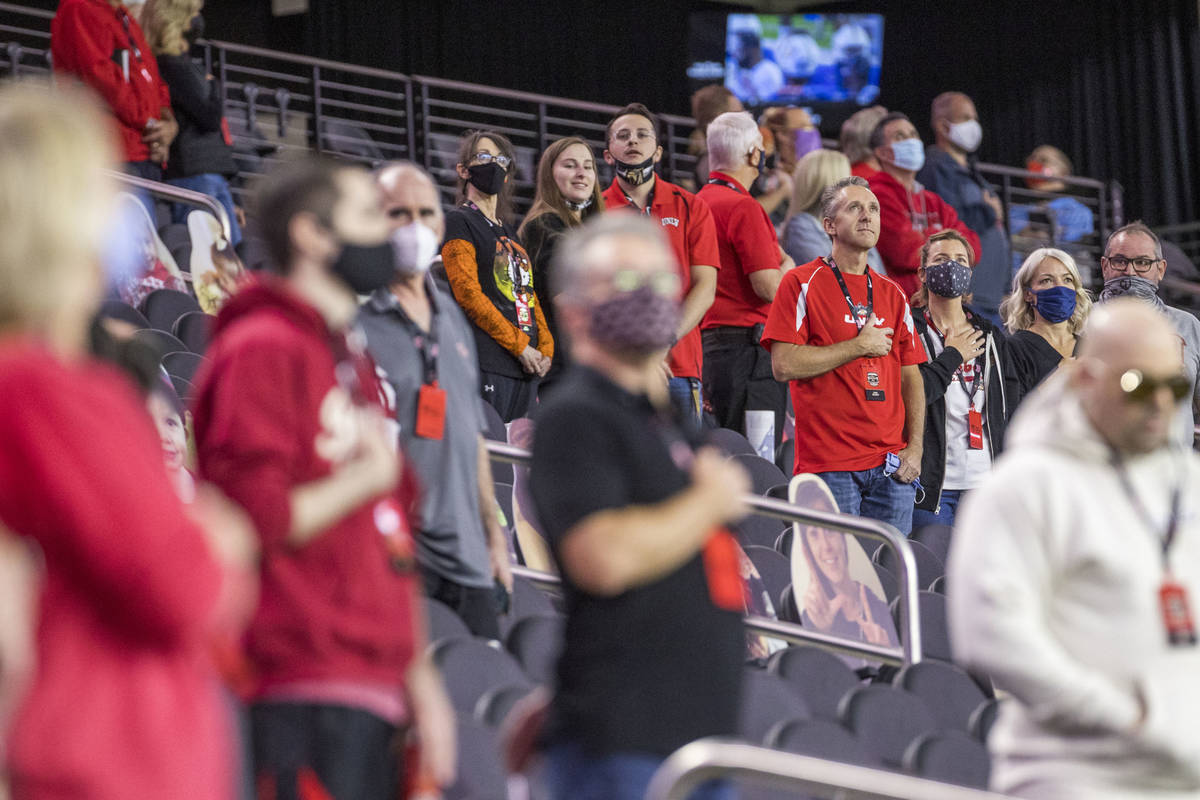 Fans stand for the National Anthem before the first half of the UNLV Rebels versus the Nevada W ...