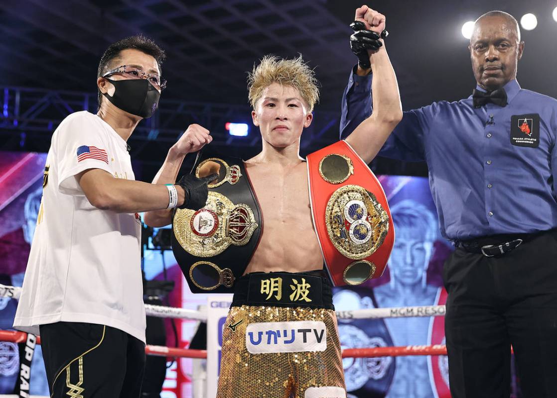 Naoya Inoue celebrates after his knockout victory over Jason Moloney in their bantamweight titl ...