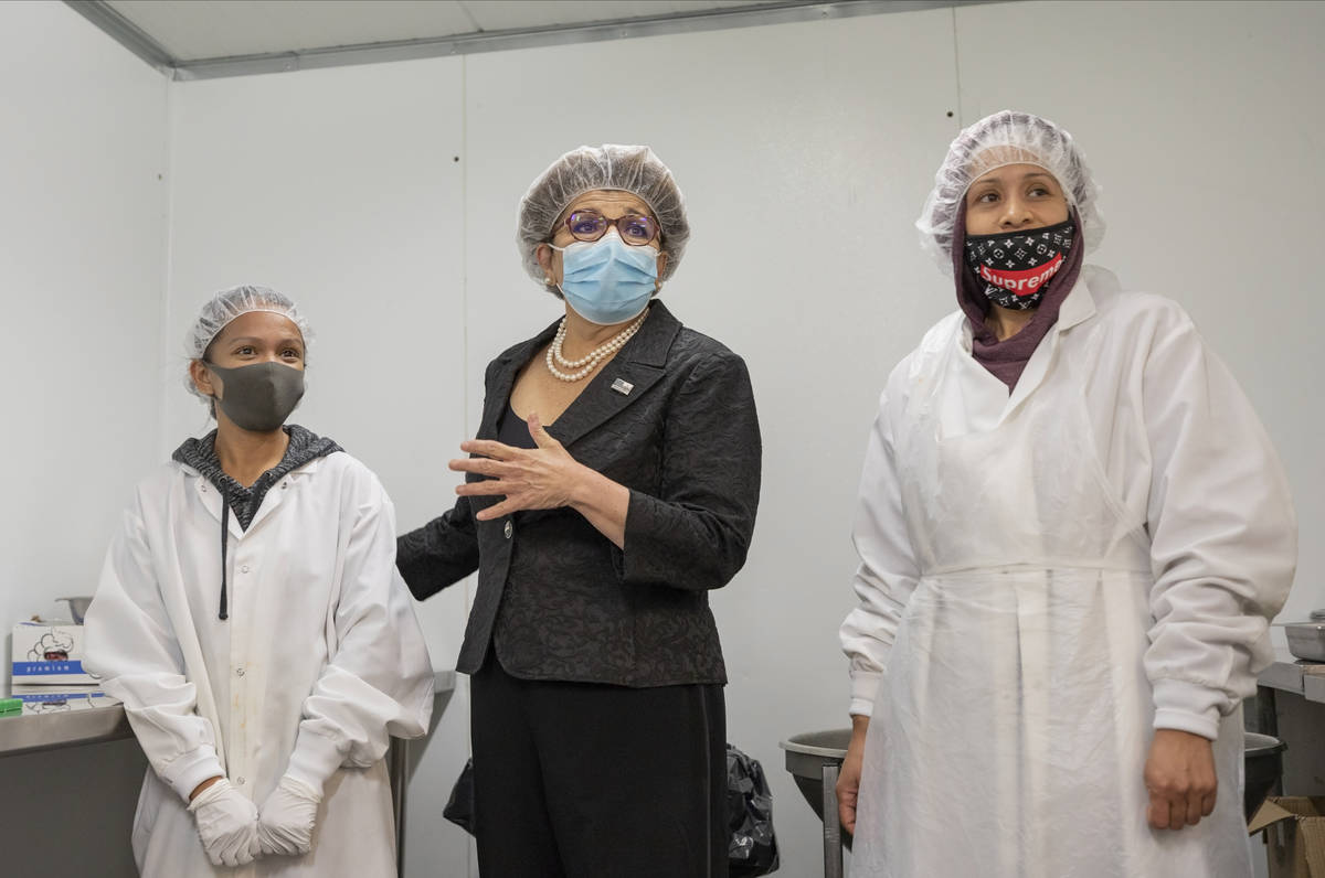 Cook Desiree Azarcon, left, U.S. Small Business Association Administrator Jovita Carranza, cent ...