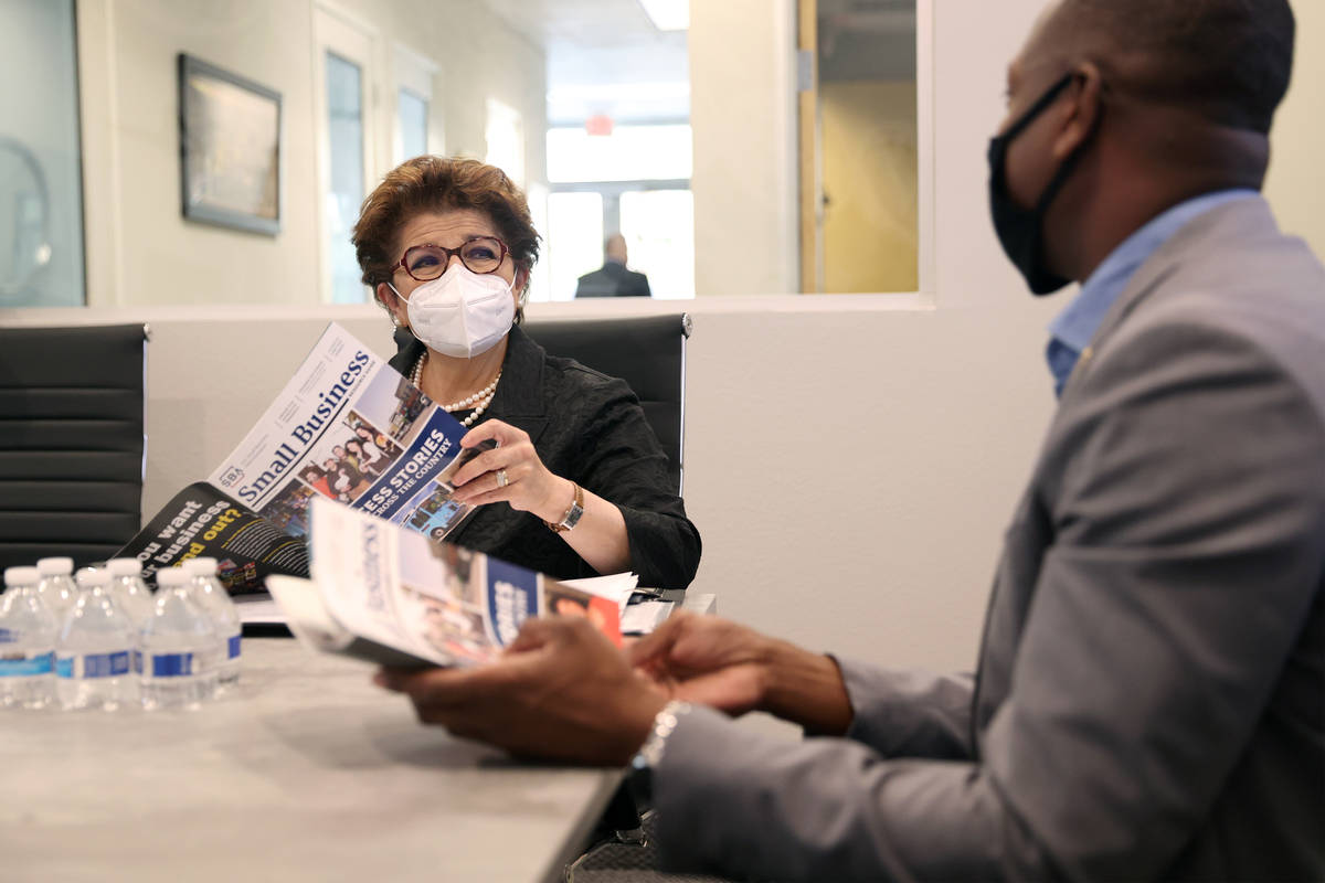 Jovita Carranza, left, Administrator of the U.S. Small Business Administration, speaks with Ren ...